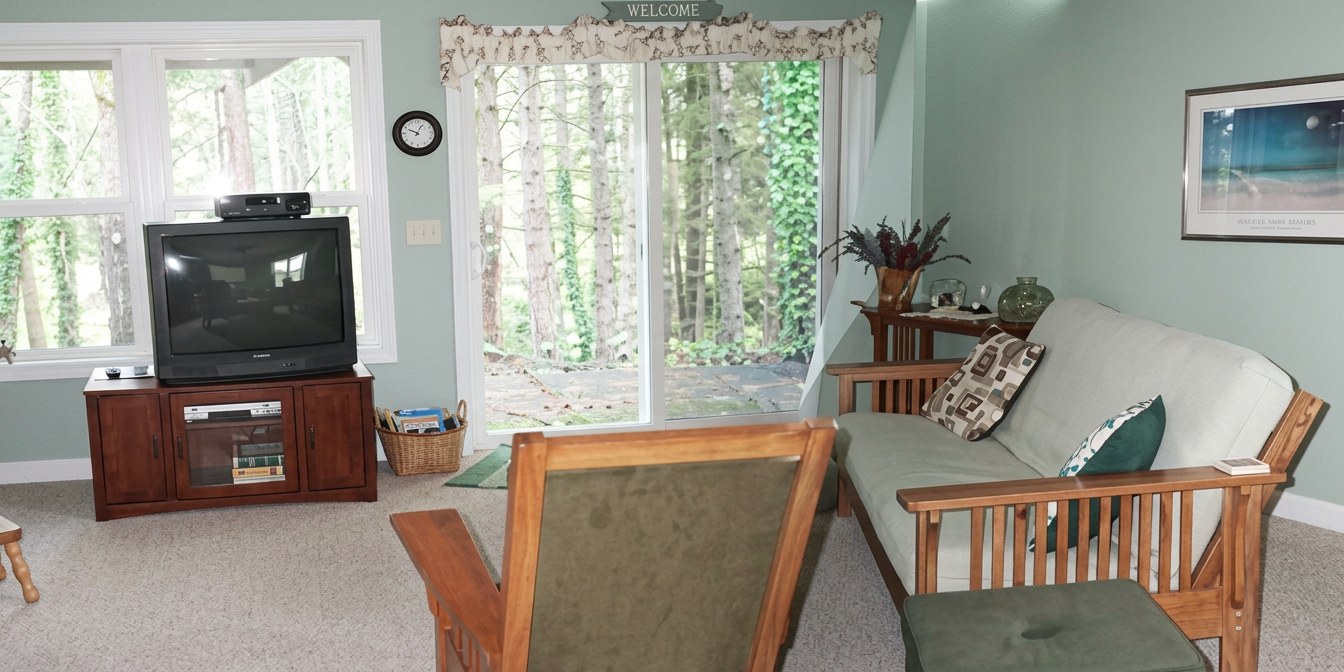Living room with double futon and coastal light